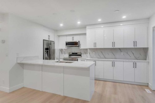 52 Saddlecreek Terrace Ne, Calgary, AB - Indoor Photo Showing Kitchen With Upgraded Kitchen