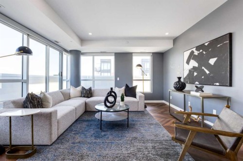 715-8445 Broadcast Avenue Sw, Calgary, AB - Indoor Photo Showing Living Room