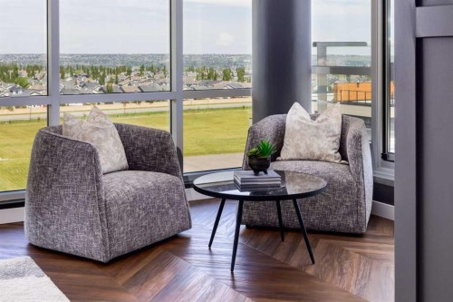 715-8445 Broadcast Avenue Sw, Calgary, AB - Indoor Photo Showing Living Room