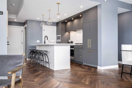 715-8445 Broadcast Avenue Sw, Calgary, AB - Indoor Photo Showing Kitchen With Upgraded Kitchen