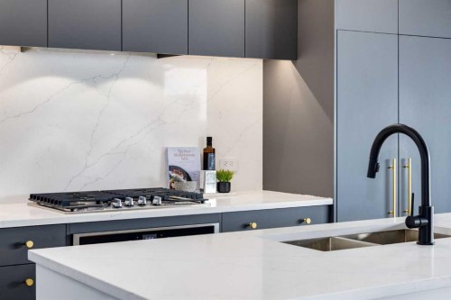 715-8445 Broadcast Avenue Sw, Calgary, AB - Indoor Photo Showing Kitchen With Upgraded Kitchen