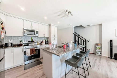 1387 148 Avenue Nw, Calgary, AB - Indoor Photo Showing Kitchen With Upgraded Kitchen