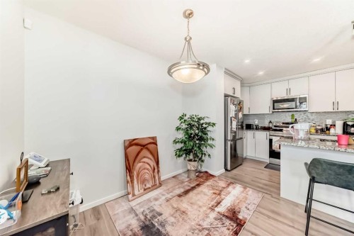 1387 148 Avenue Nw, Calgary, AB - Indoor Photo Showing Kitchen With Upgraded Kitchen