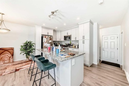 1387 148 Avenue Nw, Calgary, AB - Indoor Photo Showing Kitchen With Upgraded Kitchen