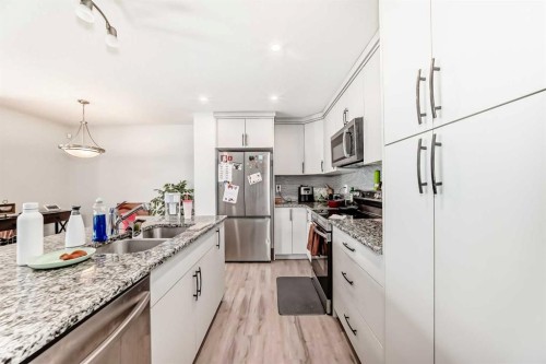 1387 148 Avenue Nw, Calgary, AB - Indoor Photo Showing Kitchen With Double Sink With Upgraded Kitchen