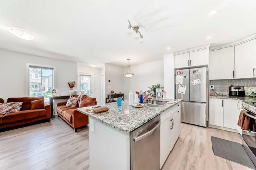 1387 148 Avenue Nw, Calgary, AB - Indoor Photo Showing Kitchen With Double Sink With Upgraded Kitchen