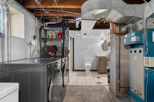 2219 41 Street Se, Calgary, AB - Indoor Photo Showing Laundry Room
