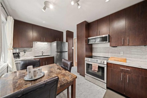 2219 41 Street Se, Calgary, AB - Indoor Photo Showing Kitchen With Stainless Steel Kitchen