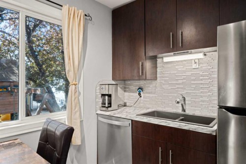 2219 41 Street Se, Calgary, AB - Indoor Photo Showing Kitchen With Double Sink With Upgraded Kitchen