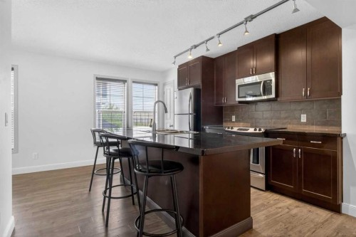 128 Auburn Bay Common Se, Calgary, AB - Indoor Photo Showing Kitchen With Stainless Steel Kitchen With Upgraded Kitchen