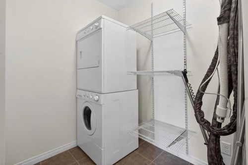 128 Auburn Bay Common Se, Calgary, AB - Indoor Photo Showing Laundry Room