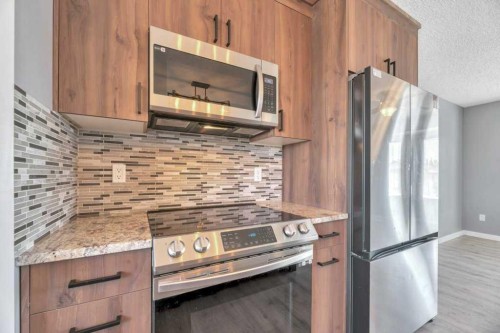 422 Cole Crescent, Carseland, AB - Indoor Photo Showing Kitchen