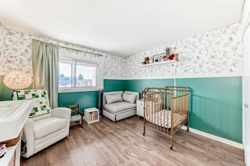 208-1305 Glenmore Trail Sw, Calgary, AB - Indoor Photo Showing Bedroom