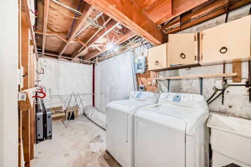 208-1305 Glenmore Trail Sw, Calgary, AB - Indoor Photo Showing Laundry Room