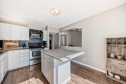 208-1305 Glenmore Trail Sw, Calgary, AB - Indoor Photo Showing Kitchen