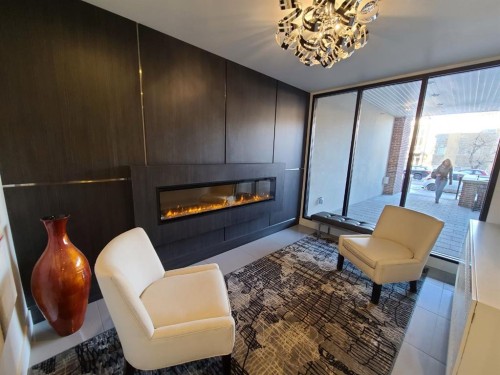 306-317 22 Avenue Sw, Calgary, AB - Indoor Photo Showing Other Room With Fireplace