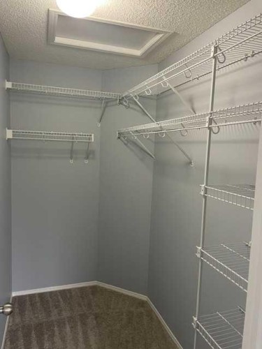 681 Evermeadow Road Sw, Calgary, AB - Indoor With Storage