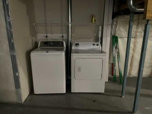 681 Evermeadow Road Sw, Calgary, AB - Indoor Photo Showing Laundry Room