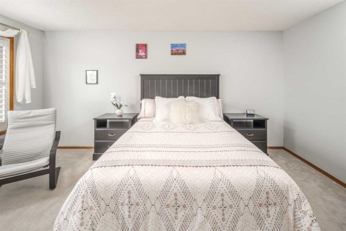 37 Arbour Summit Close Nw, Calgary, AB - Indoor Photo Showing Bedroom