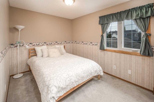 37 Arbour Summit Close Nw, Calgary, AB - Indoor Photo Showing Bedroom