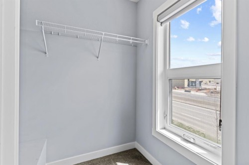 241 Livingston Common Ne, Calgary, AB - Indoor Photo Showing Other Room