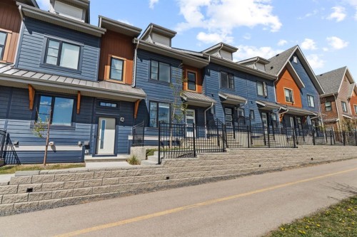 241 Livingston Common Ne, Calgary, AB - Outdoor With Facade