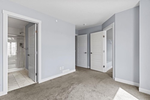 241 Livingston Common Ne, Calgary, AB - Indoor Photo Showing Other Room