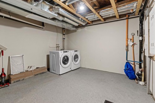 241 Livingston Common Ne, Calgary, AB - Indoor Photo Showing Laundry Room