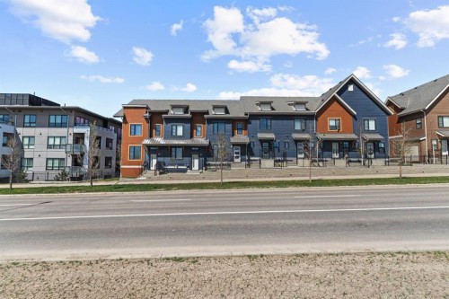 241 Livingston Common Ne, Calgary, AB - Outdoor With Balcony With Facade