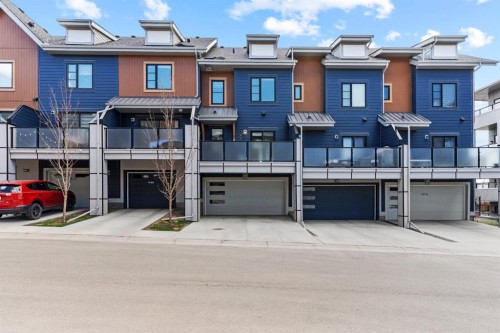 241 Livingston Common Ne, Calgary, AB - Outdoor With Balcony With Facade