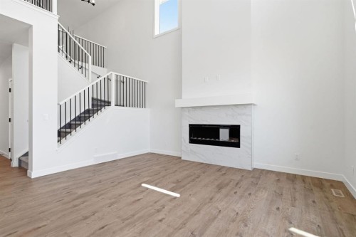 731 Langley Terrace Se, Airdrie, AB - Indoor With Fireplace