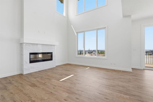 731 Langley Terrace Se, Airdrie, AB - Indoor Photo Showing Living Room With Fireplace