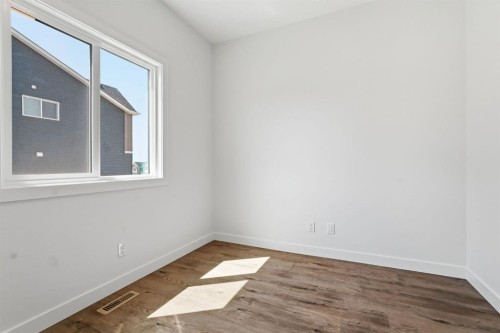 731 Langley Terrace Se, Airdrie, AB - Indoor Photo Showing Other Room