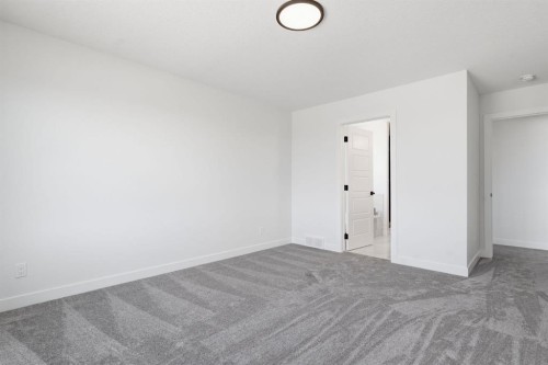 731 Langley Terrace Se, Airdrie, AB - Indoor Photo Showing Other Room