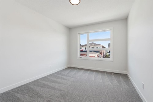731 Langley Terrace Se, Airdrie, AB - Indoor Photo Showing Other Room