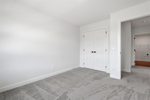 731 Langley Terrace Se, Airdrie, AB - Indoor Photo Showing Other Room