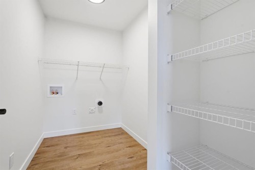 731 Langley Terrace Se, Airdrie, AB - Indoor With Storage