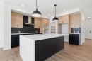 731 Langley Terrace Se, Airdrie, AB  - Indoor Photo Showing Kitchen With Upgraded Kitchen 