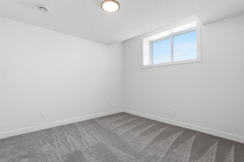 731 Langley Terrace Se, Airdrie, AB - Indoor Photo Showing Other Room