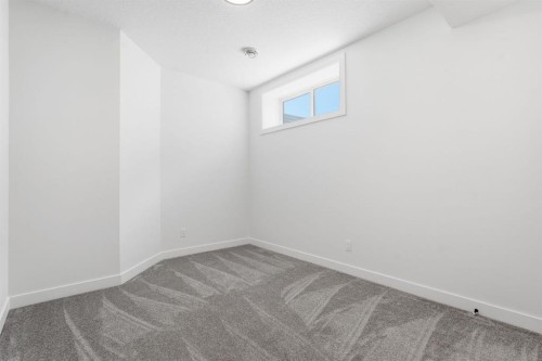 731 Langley Terrace Se, Airdrie, AB - Indoor Photo Showing Other Room
