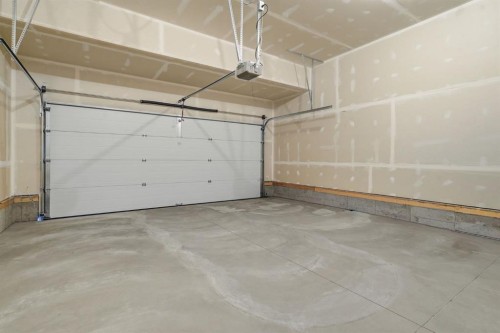 731 Langley Terrace Se, Airdrie, AB - Indoor Photo Showing Garage