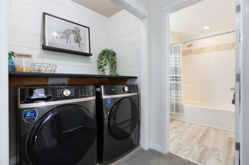 514 Stonegate Road Nw, Airdrie, AB - Indoor Photo Showing Laundry Room