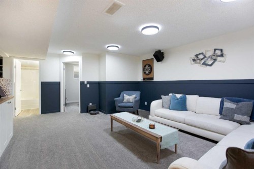 514 Stonegate Road Nw, Airdrie, AB - Indoor Photo Showing Living Room