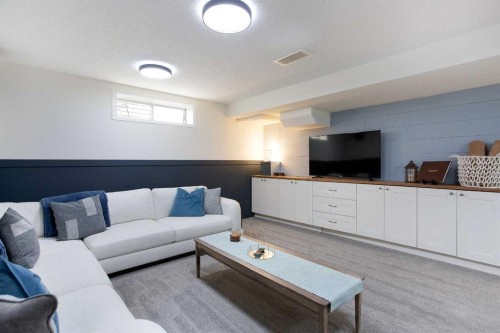 514 Stonegate Road Nw, Airdrie, AB - Indoor Photo Showing Living Room