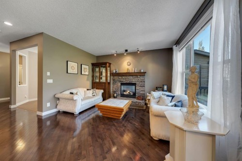 32 Everoak Close Sw, Calgary, AB - Indoor Photo Showing Living Room With Fireplace