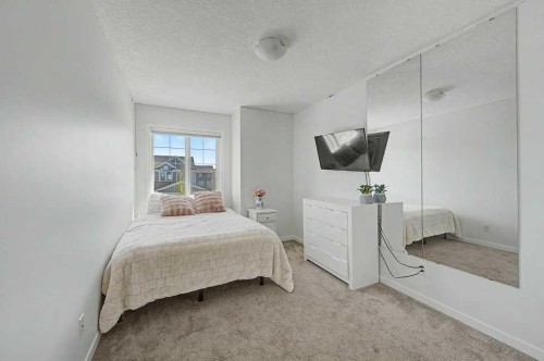 44 Auburn Glen Close Se, Calgary, AB - Indoor Photo Showing Bedroom