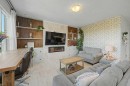 44 Auburn Glen Close Se, Calgary, AB  - Indoor Photo Showing Living Room With Fireplace 