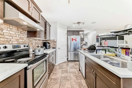 16 Skyview Springs Road Ne, Calgary, AB - Indoor Photo Showing Kitchen With Stainless Steel Kitchen With Double Sink