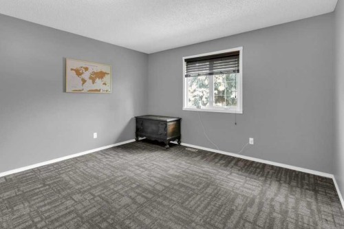120 Alpine Crescent Se, Airdrie, AB - Indoor Photo Showing Other Room
