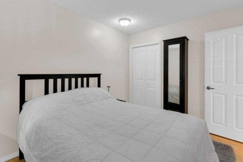 120 Alpine Crescent Se, Airdrie, AB - Indoor Photo Showing Bedroom